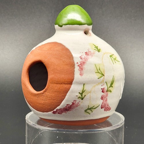 Signed hand made pottery bird - hand,